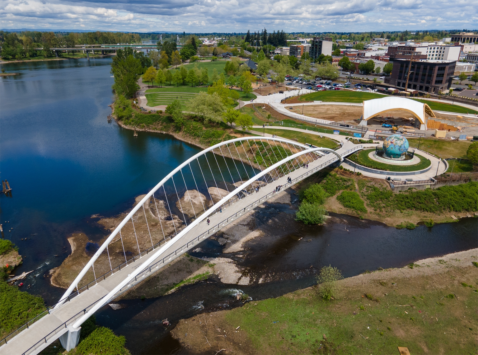 Paved walking path along the Willamette River at Minto-Brown Island Park in Salem