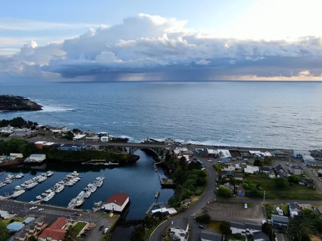 white boats on sea dock during daytime