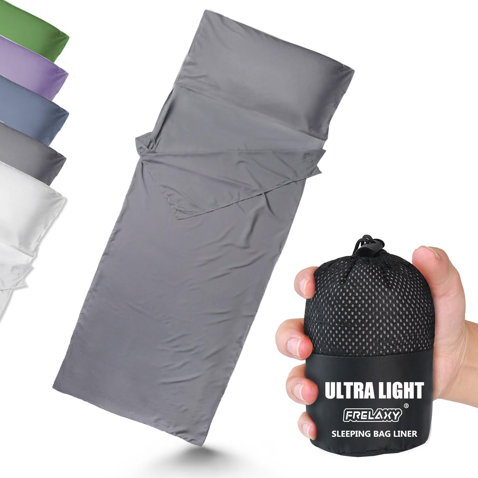 Frelaxy ultralight sleeping bag liner compressed into a compact stuff sack next to the unfolded silky liner fabric