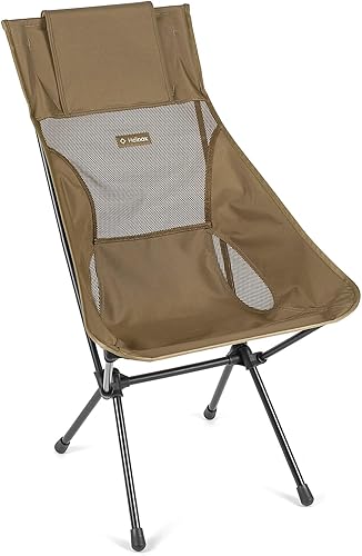 Helinox Sunset Chair on a wood deck overlooking a lake