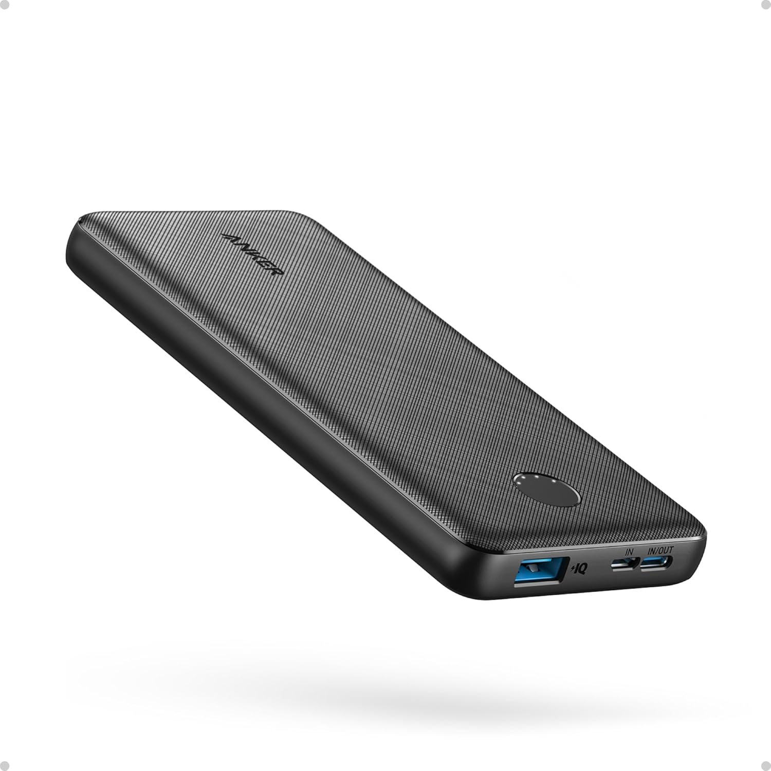 Anker PowerCore 10K compact power bank on a mossy rock in the Oregon forest
