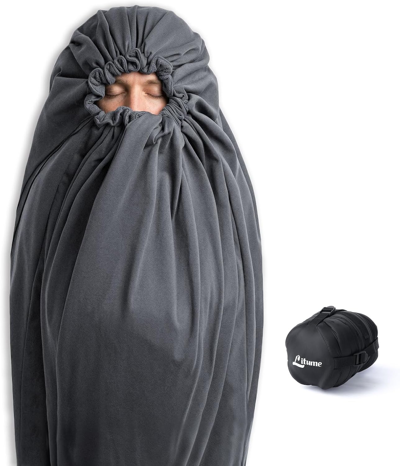 Fleece sleeping bag liner in mummy shape laid out for cold weather camping
